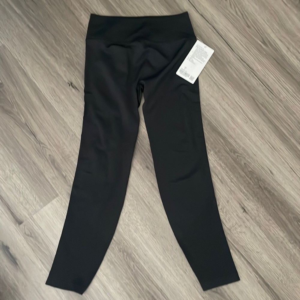 NWT Lululemon Ebb to Street tight in black size 8.